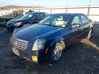 2006 Cadillac CTS with VIN 1G6DM57T060106608, listed as a IAAI auction lot 41233161 with 141,503 mi miles. Bid and sale history available at carsss.com. Image 2.