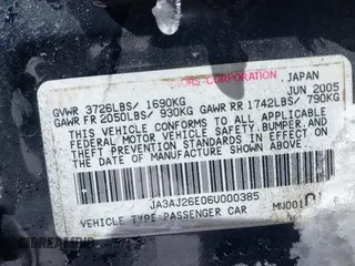 2006 Mitsubishi Lancer ES with VIN JA3AJ26E06U000385, listed as a IAAI auction lot 41587490 with 185,100 mi miles. Bid and sale history available at carsss.com. Image 9.