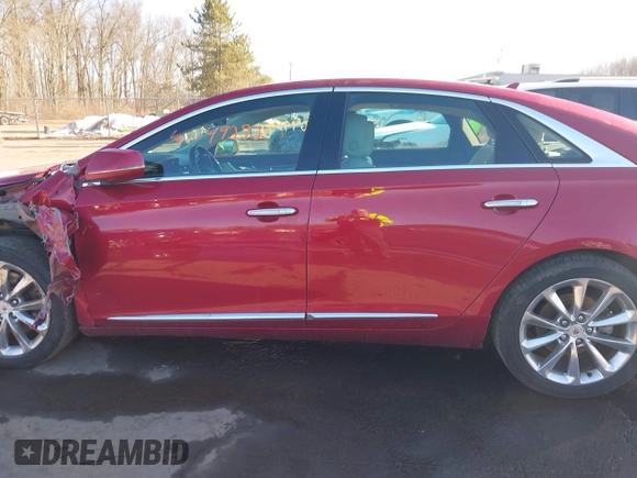 2014 Cadillac XTS Luxury z VIN 2G61N5S34E9163874, wystawiony jako IAAI lot #41649292 z przebiegiem 104 638 mil mil oraz . Historia ofert i sprzedaży dostępna na DreamBid. Obrazek 14.