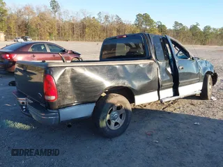 2003 Ford F-150 XL with VIN 1FTRX17W73NA09918, listed as a IAAI auction lot 41296725 with 1 mi miles. Bid and sale history available at carsss.com. Image 4.
