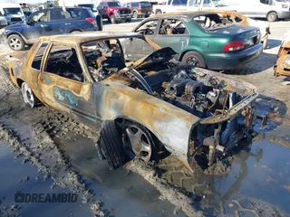 1989 Ford Mustang z VIN 1FABP40A2KF265870, wystawiony jako IAAI lot #41592216 z przebiegiem Nie podano mil oraz . Historia ofert i sprzedaży dostępna na DreamBid. Obrazek 1.