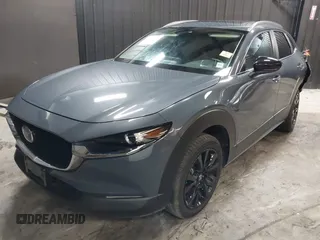 2022 Mazda CX-30 S Carbon Edition with VIN 3MVDMBCL8NM447234, listed as a IAAI auction lot 42511600 with 51,926 mi miles and . Bid and sale history available at DreamBid. Image 19.