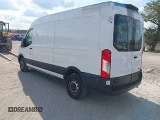 2021 Ford Transit Cargo with VIN 1FTBR1C85MKA19997, listed as a IAAI auction lot 41431285 with 61,158 mi miles and . Bid and sale history available at DreamBid. Image 3.