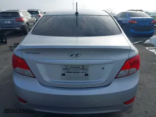 2014 Hyundai Accent GLS with VIN KMHCT4AE6EU586785, listed as a IAAI auction lot 41674060 with 135,355 mi miles. Bid and sale history available at carsss.com. Image 16.