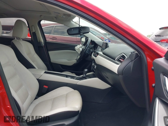 2016 Mazda 6 i Grand Touring z VIN JM1GJ1W58G1486694, wystawiony jako IAAI lot #42094443 z przebiegiem 77 803 mil mil oraz . Historia ofert i sprzedaży dostępna na DreamBid. Obrazek 5.