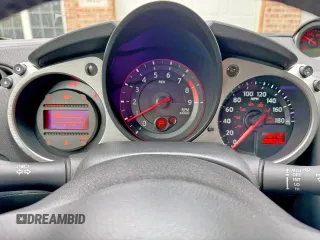 2019 Nissan 370Z z VIN JN1AZ4EH0KM422347, wystawiony jako Copart lot #60700235 z przebiegiem 46 412 mil mil oraz Czysty tytuł • Clean title. Historia ofert i sprzedaży dostępna na DreamBid. Obrazek 8.