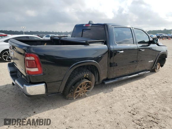 2019 Ram 1500 Laramie with VIN 1C6SRFJT4KN521147, listed as a Copart auction lot 54108615 with 152,888 mi miles and Salvage title. Bid and sale history available at DreamBid. Image 3.