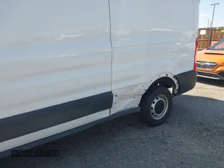 2023 Ford Transit Cargo with VIN 1FTBR1X80PKB45974, listed as a IAAI auction lot 42609404 with 35,940 mi miles and . Bid and sale history available at DreamBid. Image 6.