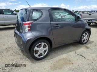 2012 Scion iQ z VIN JTNJJXB06CJ009187, wystawiony jako Copart lot #56563665 z przebiegiem 105 014 mil mil oraz Szkoda całkowita • Salvage title. Historia ofert i sprzedaży dostępna na DreamBid. Obrazek 3.