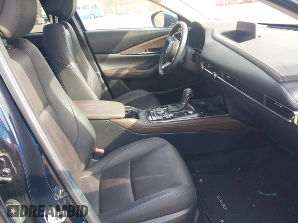 2021 Mazda CX-30 Premium with VIN 3MVDMBDM4MM238367, listed as a IAAI auction lot 42124335 with 31,120 mi miles and . Bid and sale history available at DreamBid. Image 5.