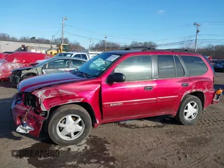 2002 GMC Envoy SLT with VIN 1GKDT13S222517064, listed as a IAAI auction lot 41590087 with 312,164 mi miles. Bid and sale history available at carsss.com. Image 17.