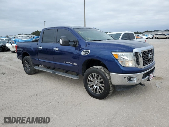 2017 Nissan Titan SL z VIN 1N6BA1F25HN514572, wystawiony jako Copart lot #85803054 z przebiegiem 79 904 mil mil oraz Czysty tytuł • Clean title. Historia ofert i sprzedaży dostępna na DreamBid. Obrazek 4.