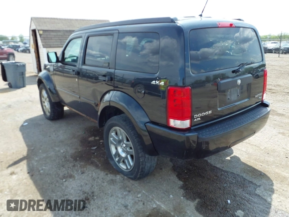 2011 Dodge Nitro Heat with VIN 1D4PU4GX9BW607580, listed as a IAAI auction lot 42105529 with 143,795 mi miles. Bid and sale history available at carsss.com. Image 3.