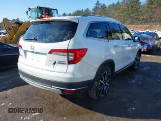 2020 Honda Pilot Elite with VIN 5FNYF6H09LB039247, listed as a IAAI auction lot 41364383 with 56,865 mi miles and . Bid and sale history available at DreamBid. Image 4.