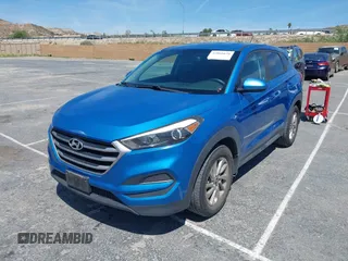 2017 Hyundai Tucson SE with VIN KM8J23A42HU423096, listed as a IAAI auction lot 42066638 with 197,618 mi miles. Bid and sale history available at carsss.com. Image 18.