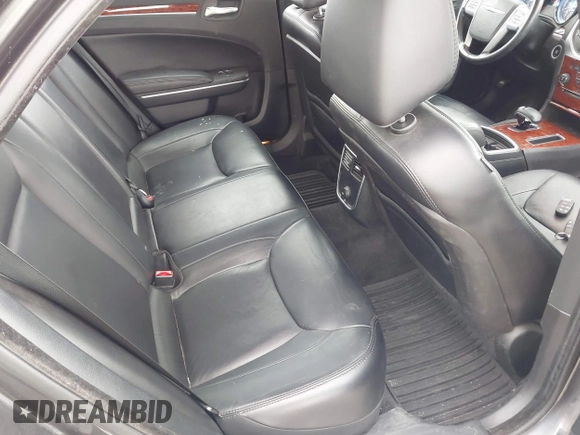 2013 Chrysler 300 with VIN 2C3CCAAG9DH707447, listed as a IAAI auction lot 42292077 with 171,329 mi miles and . Bid and sale history available at DreamBid. Image 8.