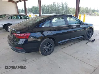 2024 Volkswagen Jetta SE with VIN 3VW7M7BU5RM052470, listed as a IAAI auction lot 42520137 with 26,902 mi miles and . Bid and sale history available at DreamBid. Image 4.
