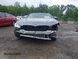 2023 BMW 8 Series 840i with VIN WBADZ2C03PCM89675, listed as a IAAI auction lot 42301276 with 6,289 mi miles and . Bid and sale history available at DreamBid. Image 6.