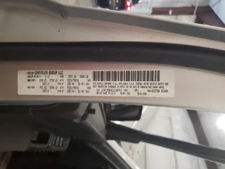 2012 Jeep Liberty Sport z VIN 1C4PJMAK0CW160741, wystawiony jako Copart lot #55936535 z przebiegiem 123 576 mil mil oraz Szkody całkowita. Historia ofert i sprzedaży dostępna na DreamBid. Obrazek 13.