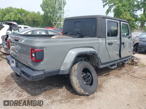 2020 Jeep Gladiator Overland with VIN 1C6HJTFG0LL169628, listed as a IAAI auction lot 42476729 with 102,874 mi miles and . Bid and sale history available at DreamBid. Image 4.