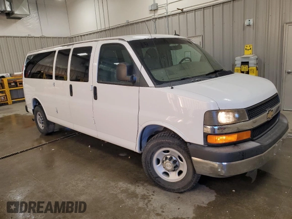 2013 Chevrolet Express Passenger LT with VIN 1GAZG1FG5D1118406, listed as a Copart auction lot 81705434 with 87,326 mi miles and Salvage title. Bid and sale history available at DreamBid. Image 4.