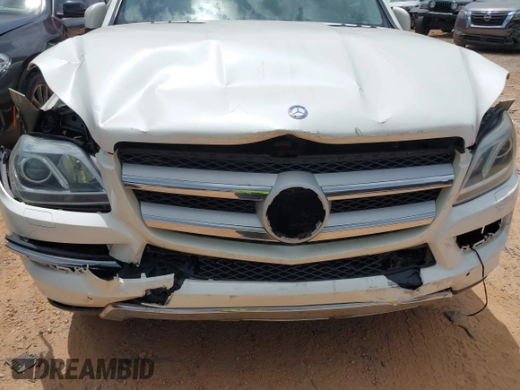 2014 Mercedes-Benz GL 450 z VIN 4JGDF7CE2EA287810, wystawiony jako IAAI lot #39696896 z przebiegiem 181 816 mil mil oraz . Historia ofert i sprzedaży dostępna na DreamBid. Obrazek 6.