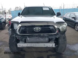 2015 Toyota Tacoma with VIN 3TMLU4EN8FM167337, listed as a IAAI auction lot 42117662 with 60,929 mi miles. Bid and sale history available at carsss.com. Image 12.