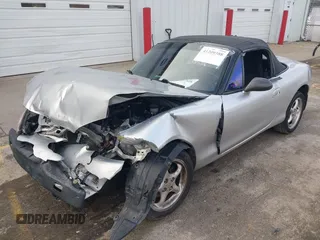 2002 Mazda MX-5 Miata Cloth z VIN JM1NB353320230803, wystawiony jako IAAI lot #41209388 z przebiegiem 84 815 mil mil oraz . Historia ofert i sprzedaży dostępna na DreamBid. Obrazek 2.