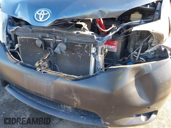 2014 Toyota Sienna LE AAS with VIN 5TDKK3DC4ES514981, listed as a IAAI auction lot 41601188 with 164,963 mi miles and . Bid and sale history available at DreamBid. Image 6.