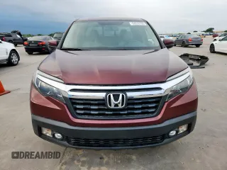 2019 Honda Ridgeline RTL-T with VIN 5FPYK2F60KB002573, listed as a Copart auction lot 63570755 with 111,388 mi miles and Salvage title. Bid and sale history available at DreamBid. Image 5.