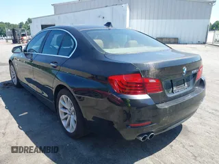 2014 BMW 5 Series 535d with VIN WBAXA5C52ED689410, listed as a IAAI auction lot 42554790 with 136,744 mi miles and . Bid and sale history available at DreamBid. Image 3.
