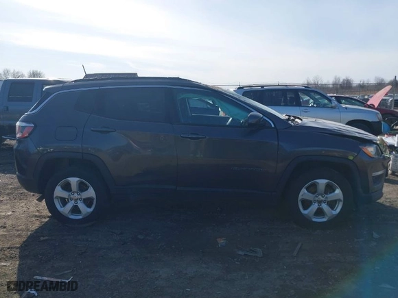 2019 Jeep Compass Latitude with VIN 3C4NJDBB2KT760879, listed as a IAAI auction lot 41828861 with 68,450 mi miles. Bid and sale history available at carsss.com. Image 14.