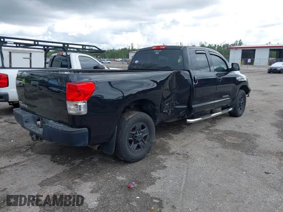2011 Toyota Tundra 2WD Truck SR with VIN 5TFTY5F14BX007238, listed as a IAAI auction lot 41663289 with 126,499 mi miles. Bid and sale history available at carsss.com. Image 4.