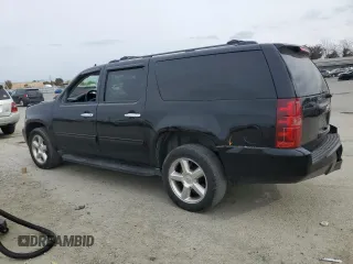 2013 Chevrolet Suburban LT with VIN 1GNSCJE01DR349353, listed as a Copart auction lot 54526315 with Not provided miles and Salvage title. Bid and sale history available at DreamBid. Image 2.