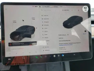 2023 Tesla Model 3 z VIN 5YJ3E1EA7PF600239, wystawiony jako Copart lot #56557705 z przebiegiem 18 851 mil mil oraz Szkoda całkowita • Salvage title. Historia ofert i sprzedaży dostępna na DreamBid. Obrazek 9.