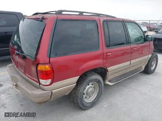 2000 Mercury Mountaineer Convenience with VIN 4M2ZU66E9YUJ31251, listed as a IAAI auction lot 41490035 with 310,778 mi miles. Bid and sale history available at carsss.com. Image 4.