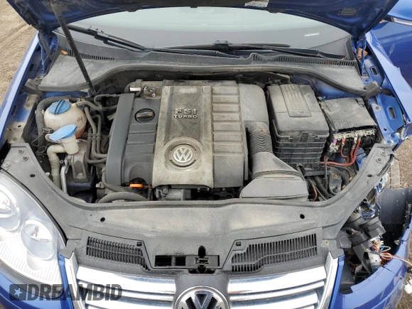 2008 Volkswagen Jetta z VIN 3VWRJ31K68M067231, wystawiony jako Copart lot #53196704 z przebiegiem 161 525 mil mil oraz Szkoda całkowita • Salvage title. Historia ofert i sprzedaży dostępna na DreamBid. Obrazek 11.