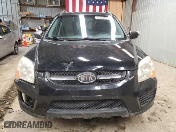 2009 Kia Sportage LX with VIN KNDJF724597564338, listed as a Copart auction lot 44123195 with 113,132 mi miles and Salvage Title. Bid and sale history available at carsss.com. Image 5.
