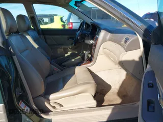 2000 Subaru Legacy Outback Limited z VIN 4S3BH6865Y7635344, wystawiony jako IAAI lot #41268034 z przebiegiem 176 647 mil mil oraz . Historia ofert i sprzedaży dostępna na DreamBid. Obrazek 5.