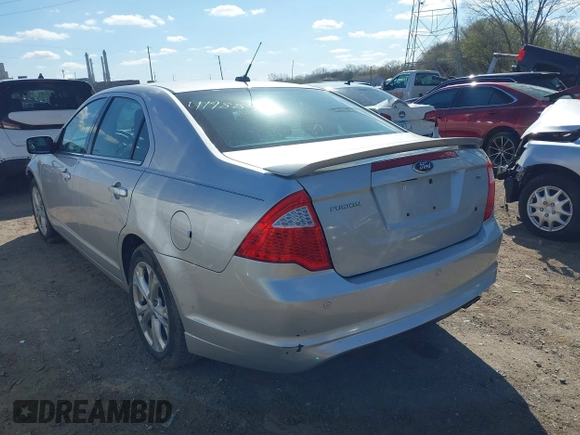 2012 Ford Fusion SE with VIN 3FAHP0HA9CR210330, listed as a IAAI auction lot 41988499 with 165,395 mi miles and . Bid and sale history available at DreamBid. Image 3.