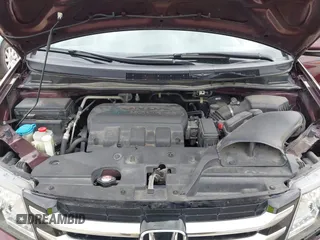 2014 Honda Odyssey Touring with VIN 5FNRL5H9XEB073156, listed as a IAAI auction lot 41990714 with 166,129 mi miles and . Bid and sale history available at DreamBid. Image 10.