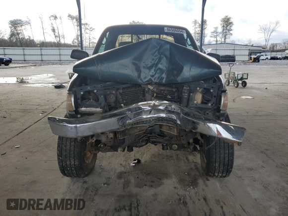 1996 Toyota Tacoma with VIN 4TAWM72N4TZ103661, listed as a Copart auction lot 86506054 with 197,518 mi miles and Salvage title. Bid and sale history available at DreamBid. Image 5.
