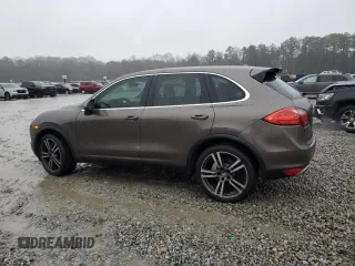 2013 Porsche Cayenne S с VIN WP1AB2A25DLA80568, выставлен на аукционе Copart как лот 43983015 с пробегом 105 779 миль миль и Списание • Salvage title. История ставок и продаж доступна на DreamBid. Изображение 2.