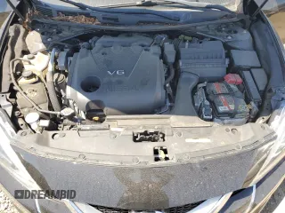 2017 Nissan Maxima SR с VIN 1N4AA6AP9HC412661, выставлен на аукционе Copart как лот 58539115 с пробегом 111 402 миль миль и Списание • Salvage title. История ставок и продаж доступна на DreamBid. Изображение 11.