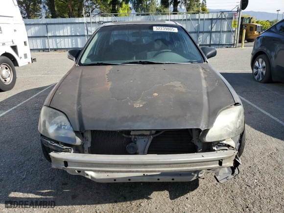 2000 Honda Civic VP with VIN 2HGEJ6612YH577711, listed as a Copart auction lot 52239805 with 195,138 mi miles and Salvage Title. Bid and sale history available at carsss.com. Image 5.