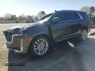 2021 Cadillac Escalade Premium Luxury z VIN 1GYS4CKL6MR249968, wystawiony jako Copart lot #47406705 z przebiegiem 28 937 mil mil oraz Szkoda całkowita • Salvage title. Historia ofert i sprzedaży dostępna na DreamBid. Obrazek 1.