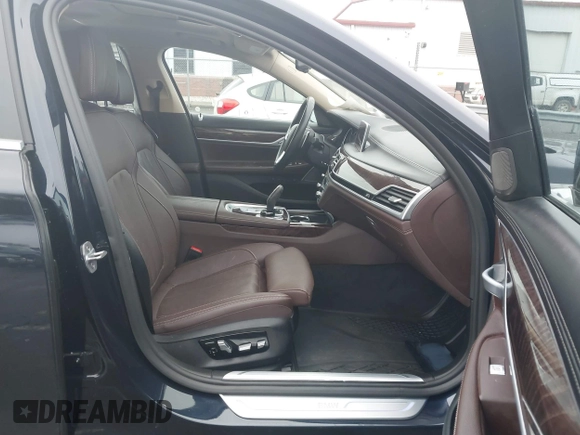 2019 BMW 7 Series 740i xDrive with VIN WBA7E4C52KGV70359, listed as a IAAI auction lot 41421504 with 55,734 mi miles and . Bid and sale history available at carsss.com. Image 5.