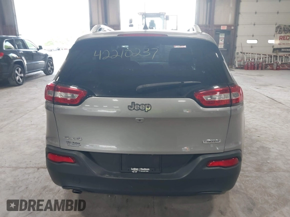 2016 Jeep Cherokee Latitude z VIN 1C4PJMCB9GW148882, wystawiony jako IAAI lot #42210237 z przebiegiem 124 441 mil mil oraz . Historia ofert i sprzedaży dostępna na DreamBid. Obrazek 16.