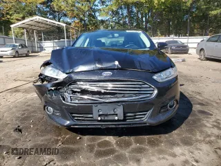2014 Ford Fusion SE with VIN 3FA6P0H90ER323616, listed as a Copart auction lot 77161924 with 69,699 mi miles and Salvage Title. Bid and sale history available at carsss.com. Image 5.