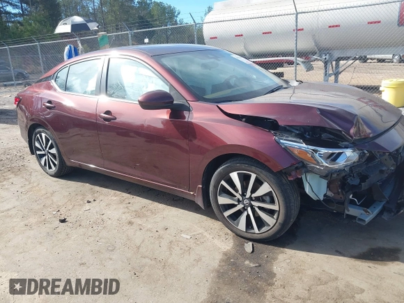2022 Nissan Sentra SV z VIN 3N1AB8CV5NY221159, wystawiony jako IAAI lot #41322470 z przebiegiem 27 098 mil mil oraz . Historia ofert i sprzedaży dostępna na DreamBid. Obrazek 1.